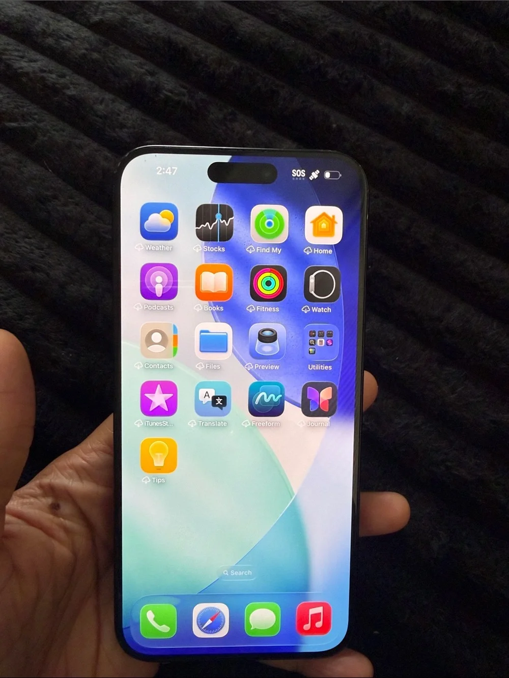 Apple iPhone in Black with Blue-Green Display Accent